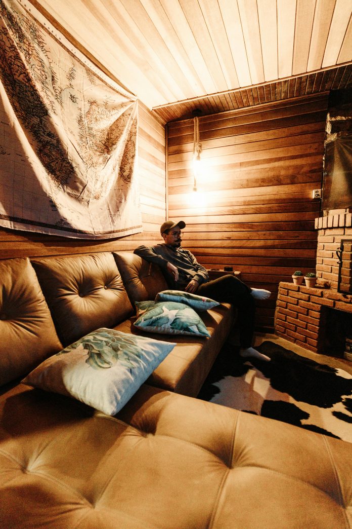 Man sitting on a comfortable sofa