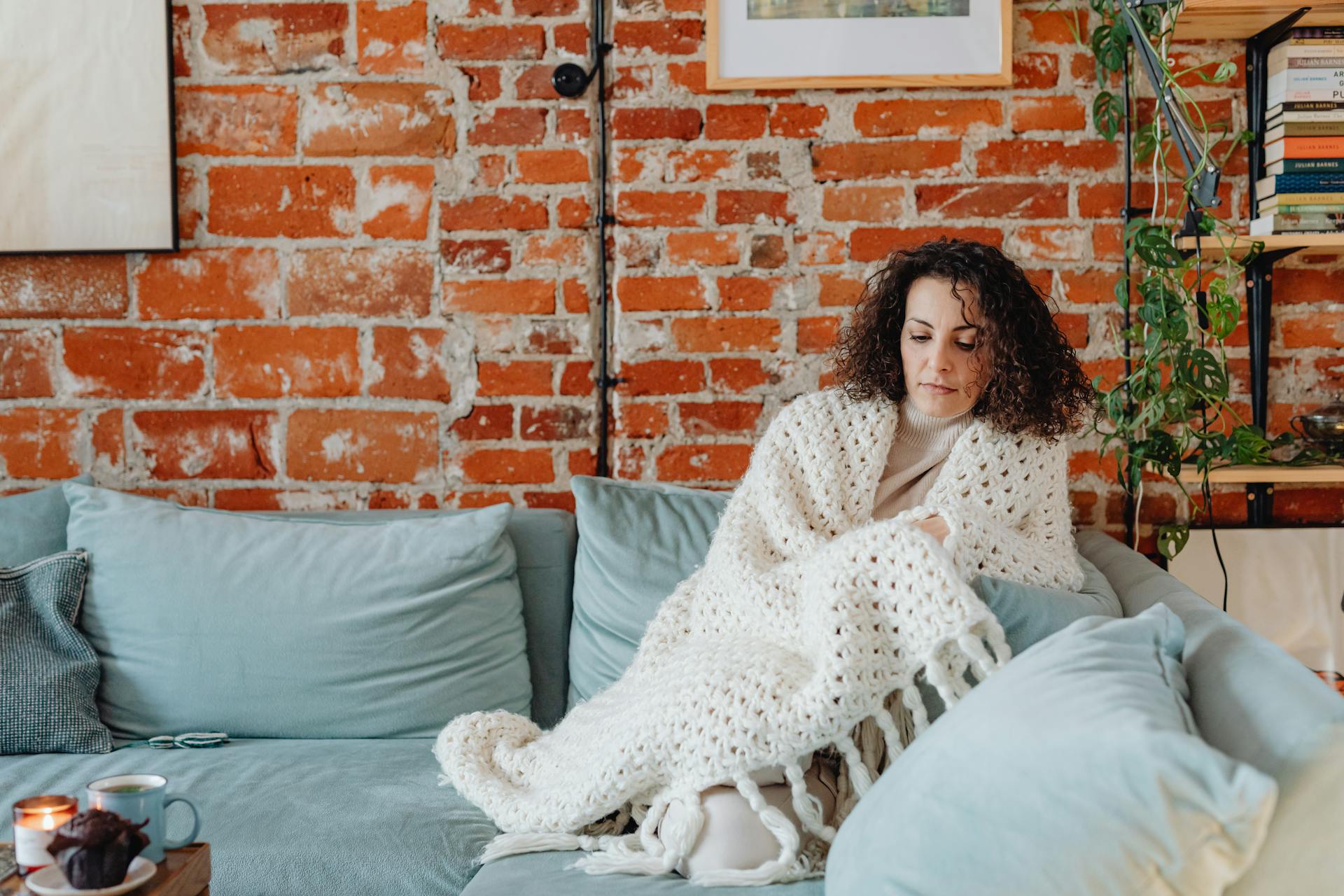 A woman sitting on the sofa